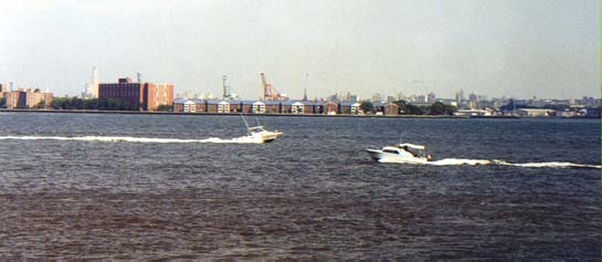 Motor Boat With City Background